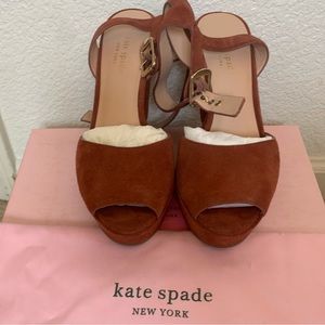 Super cute and comfy Kate spade dark tawny split suede wedges.